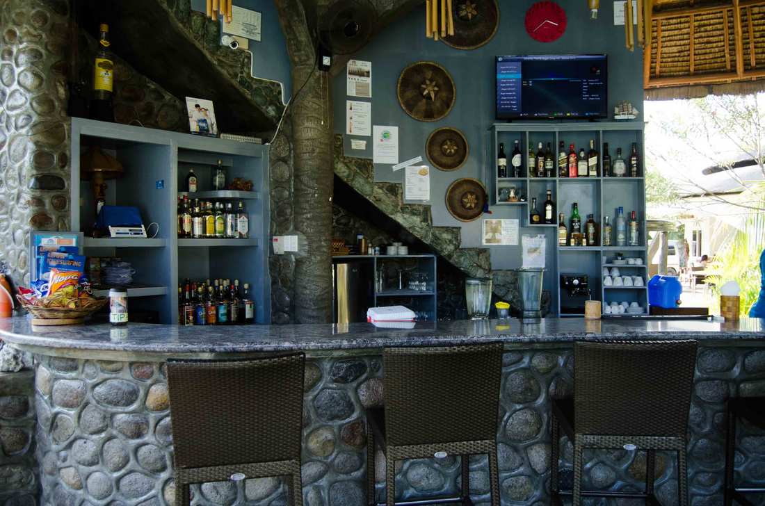 Stone-built bar with a tree growing through it