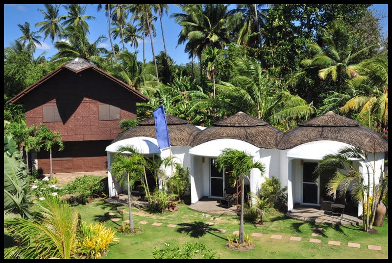 White dome bungalow with a chocolate-brown roof at White Chocolate Hills Resort